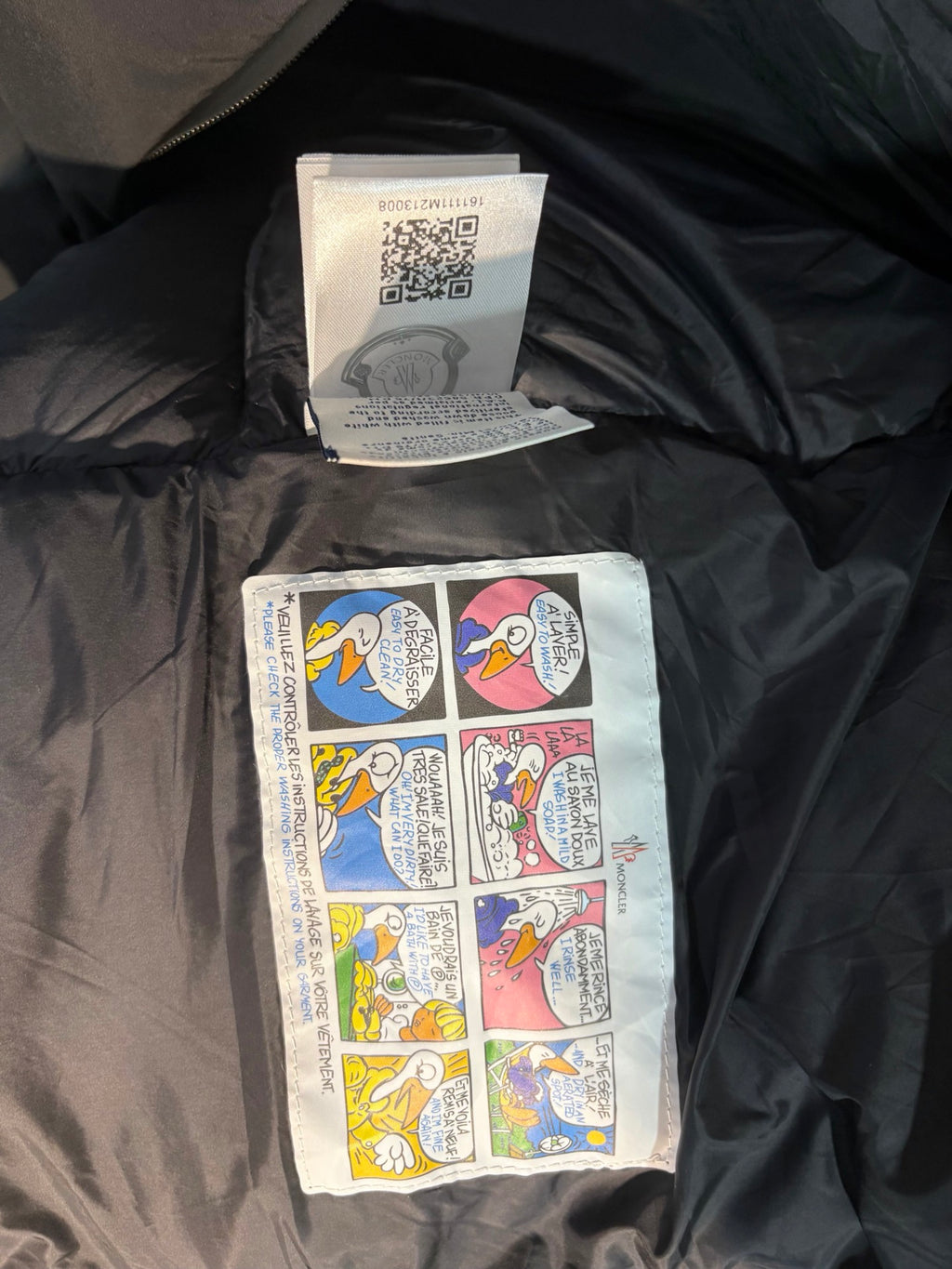 Gilet à capuche en duvet Moncler