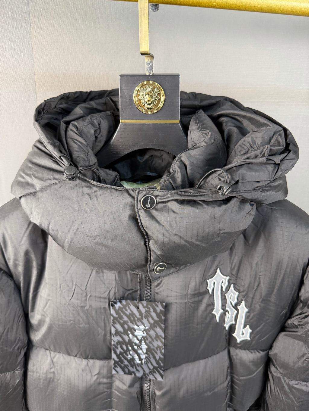 : Blouson matelassé à capuche TSL**