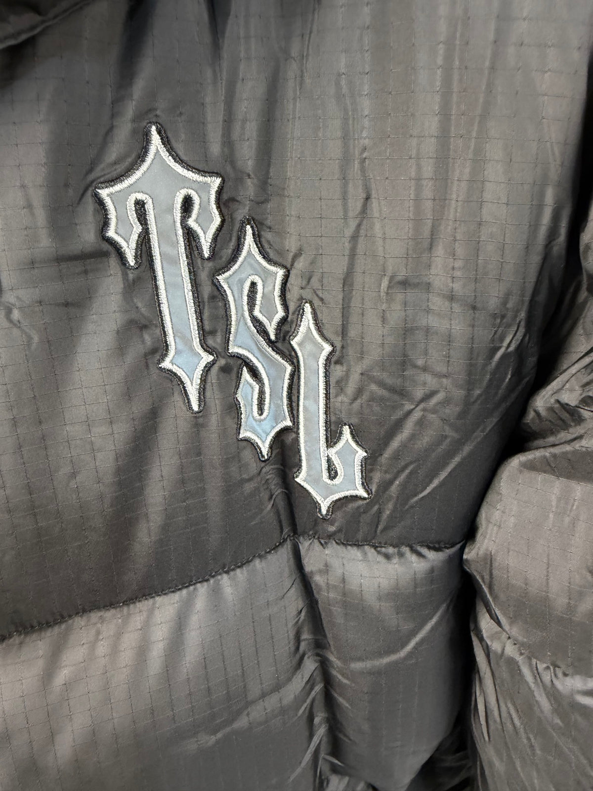 : Blouson matelassé à capuche TSL**