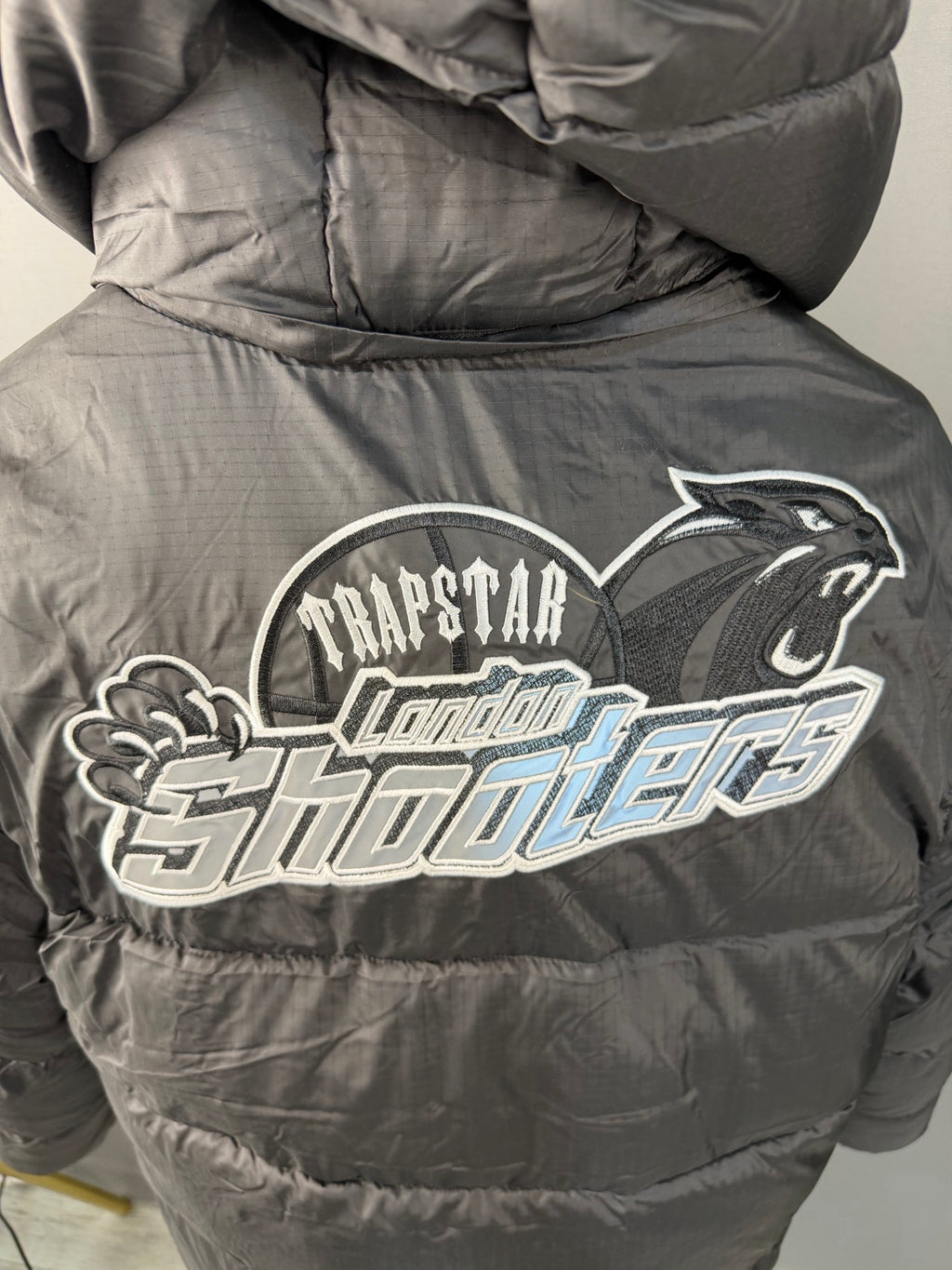 : Blouson matelassé à capuche TSL**